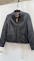 Size large Wilsons, black leather jacket