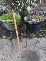 2 plant stands with pots