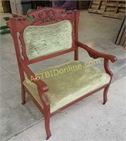 Antique Upholstered Chair on Wooden Caster Wheels