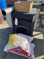 Pellet Stove w/floor pad,piping & 3 bags pellets