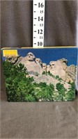 sealed 100 pc puzzle Mt. Rushmore
