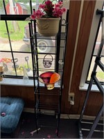 Tall metal rack w/ contents