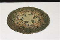 A Vintage Miniature Round Rug