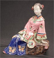 Decorative ceramic figure of seated Japanese lady