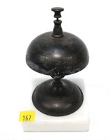 Iron desk bell on milk glass base