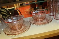 LOT OF TWO PINK DEPRESSION CUPS AND SAUCERS