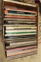 box of sheet music and books