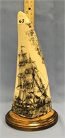 A fabulous scrimshawed sailing vessel being attack