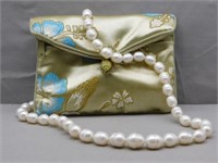 Sterling Silver pearl necklace.