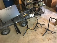 Music stand, and 3 guitar stands