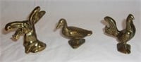 Small brass figurines inc. openers.
