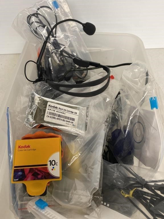 Box of cords, ink cartridges, and a usb port