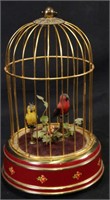 ANTIQUE MECHANICAL SINGING BIRDS IN A CAGE