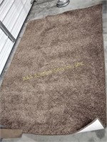 Brown rug, good condition, 58 x 85