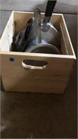 Crate of pots and pressure cooker