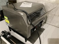 Electric conveyer toaster-works as it should