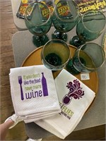 Wooden tray, six wine glasses, and two wine towels