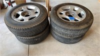 4) P205/65R15 tires with rims
