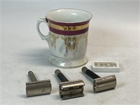 Vintage razors with shaving mug and blades