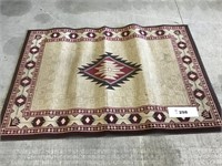 AREA RUG 47 in x 66 1/2 in. Needs cleaned