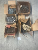 Several boxes of various nails