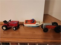 Die Cast Cub Cadet and Ford Tractor, Plastic Boat