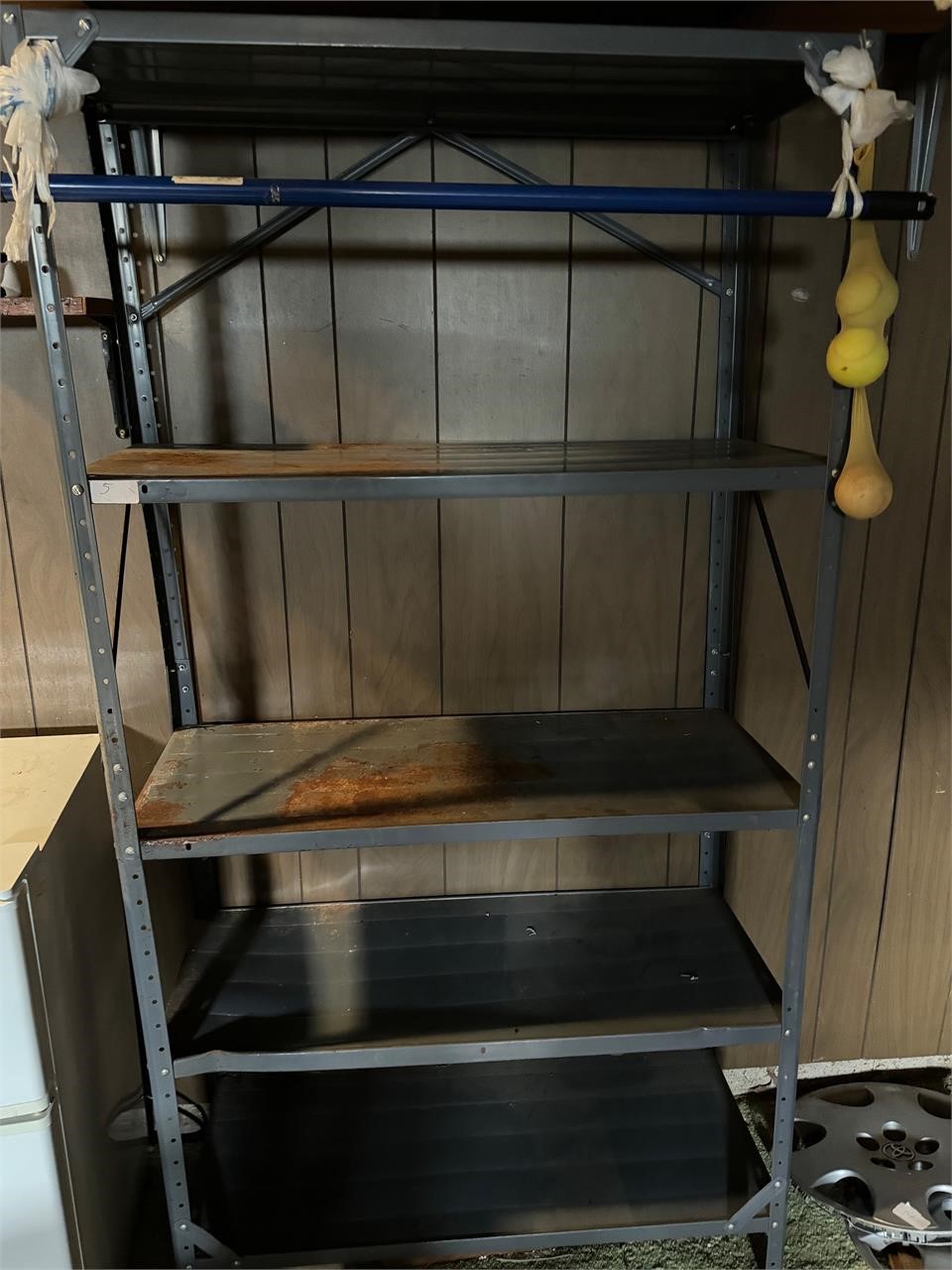 5 TIER SHELVING UNIT BENT WITH A LITTLE RUST