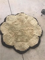 Bowron sheep skin rug. 54 x 54