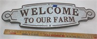 Metal "Welcome to our farm" sign