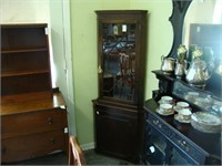 Petite mahogany corner cabinet.