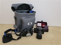 (2) Nikon 35mm Cameras w/ Accessories & Bag
