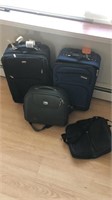 2 carry on suitcases and 2 computer bags