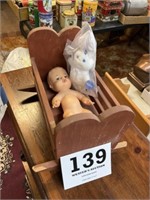 Small wooden doll cradle