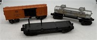 Lionel 3451 Log Dump Car, Sunoco Tanker, Santa Fe