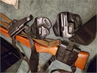 Lot of Holsters and Wood Rifle Shell