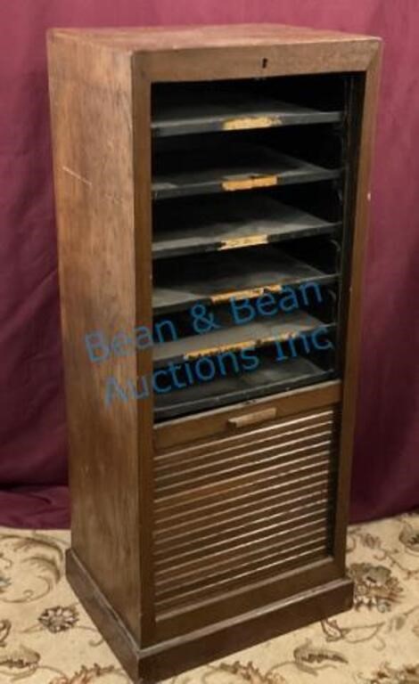 Oak roll front file cabinet