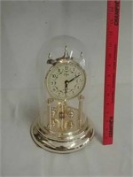 Elgin mantle clock with pendulum and glass cover