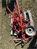 PALLET WITH MISCELLANEOUS IMPLEMENT AND TRACTOR