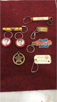 8 vintage advertising keychains.  Many from