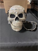 Glitter skull purse.