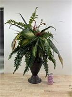 Large metal vase with artificial greenery