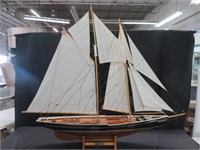 MODEL SHIP ON STAND TITLED BLUE NOSE