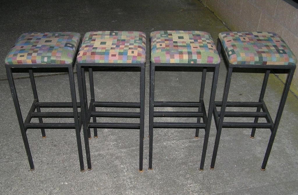 Set of 4 high quality all metal stools with uphols