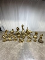 Assortment of gold painted ducks and other birds