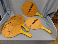 Four 1970's Kadema wooden beach ball paddles,
