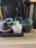 Assortment of plastic gardening trays, plastic