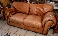 Leather loveseat 68" l - smoke free home