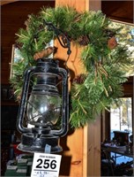 Wreath with lantern (crack in glass)