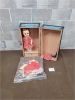 Vintage doll with suit case and clothes