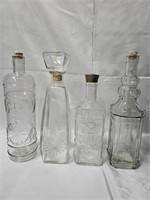 FOUR DECORATIVE GLASS BOTTLES THREE ARE 12" ONE